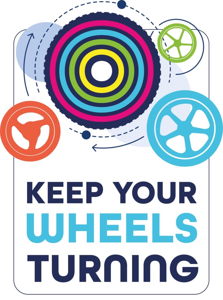 Keep Your Wheels Turning Keep Your Wheels Turning logo which shows the text and a variety of wheels with arrows to show the motion