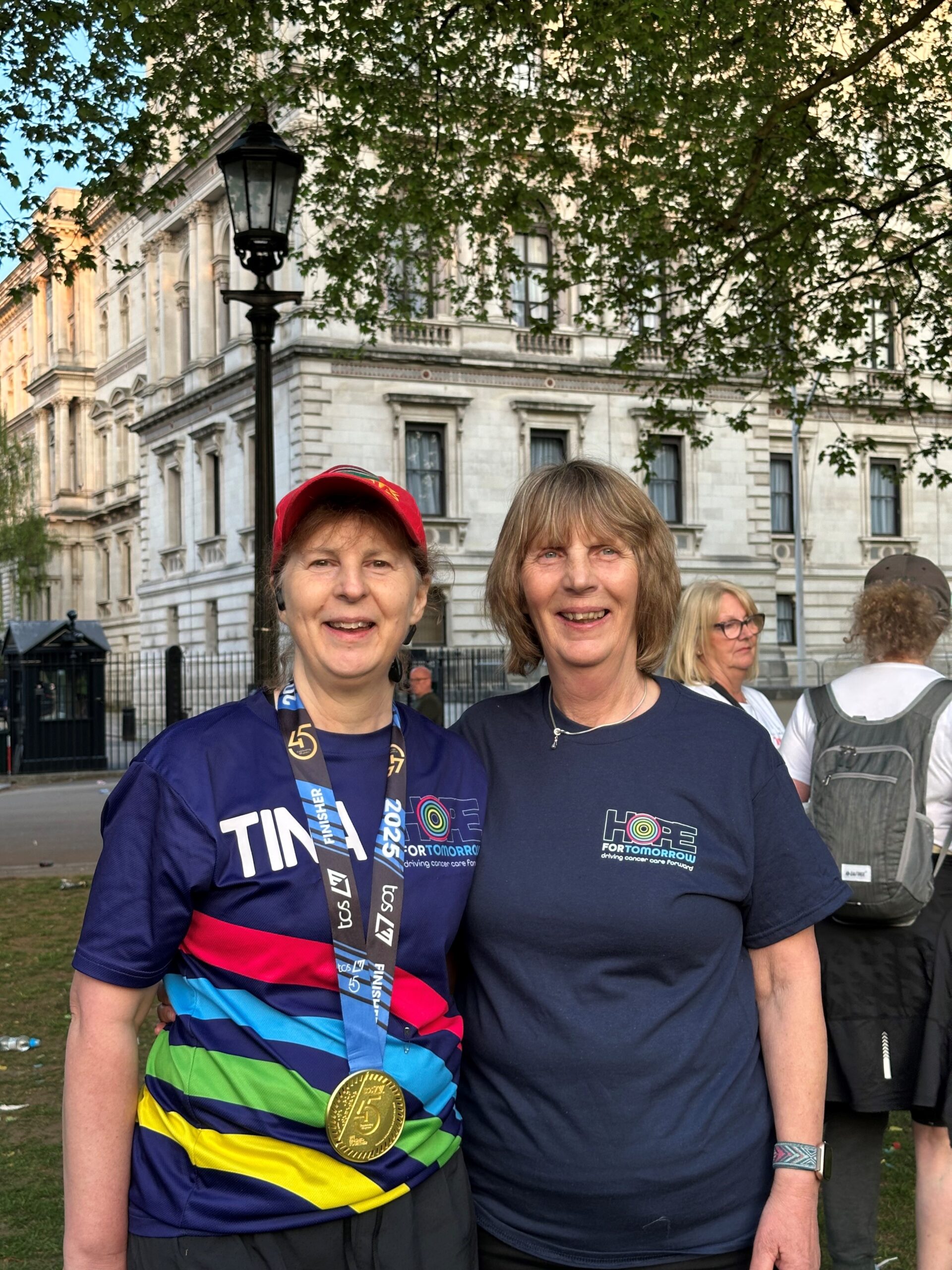 Tina Dyer-Slade after London Marathon Tina Dyer-Slade after London Marathon - standing with her sister - Michele