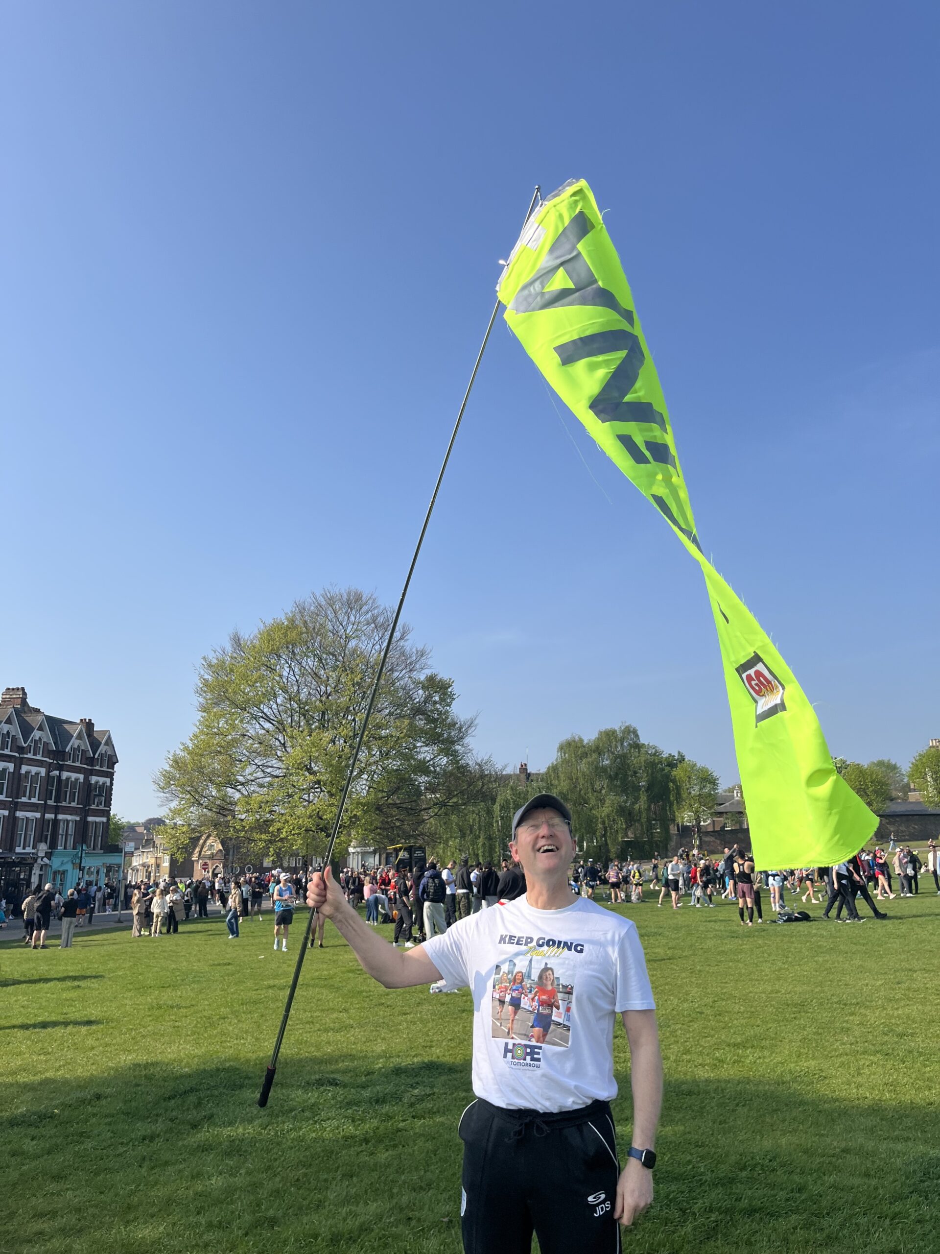 Tina Dyer Slade husband with banner