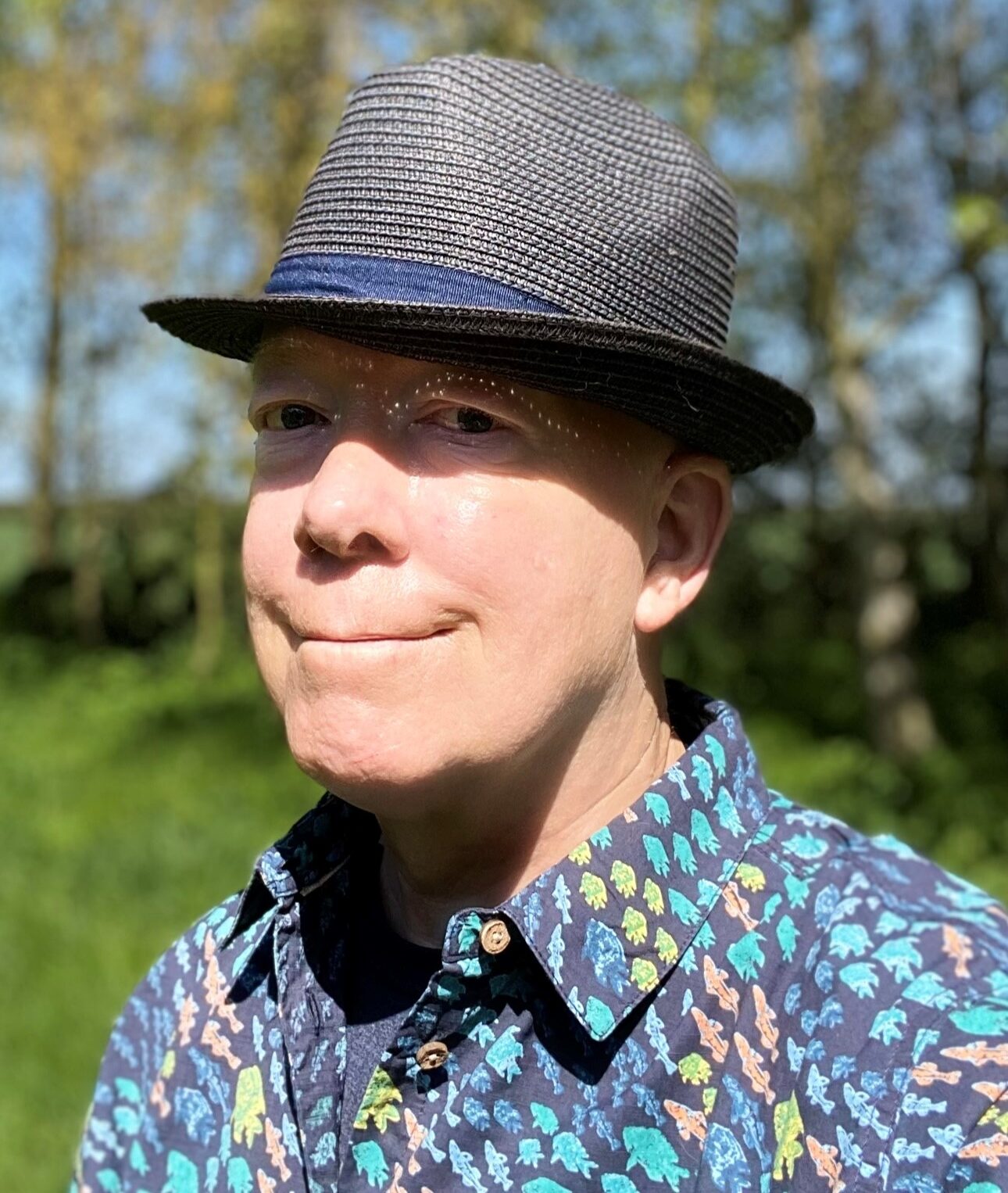 Image of Peter Birkinshaw Peter Birkinshaw enjoying the sunshine with his hat on.