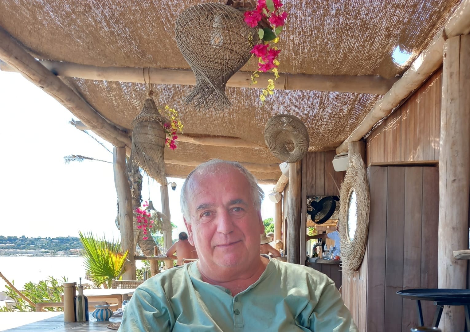 An image of Mick McLean smiling on holiday