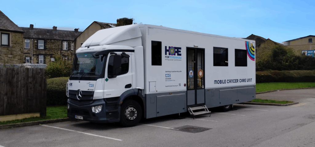 An image of 'Linda', one of Airedale's two mobile cancer care units in operation in the region, parked up in a local car park