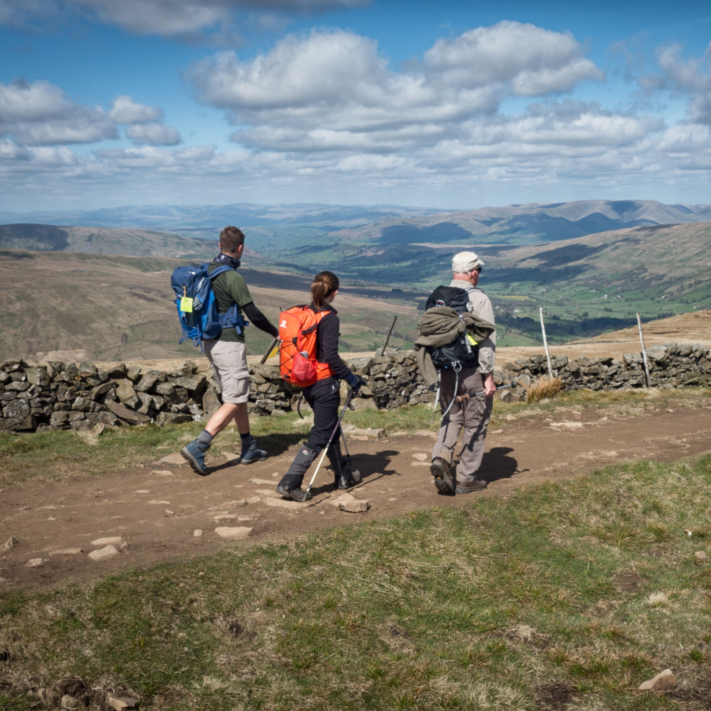 Three participants walking during the Yorkshire 3 Peaks Challenge