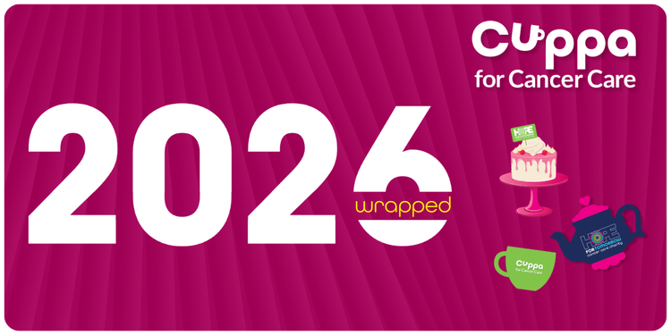 Luke sat in a hospital chair in a hospital gown after going through surgery