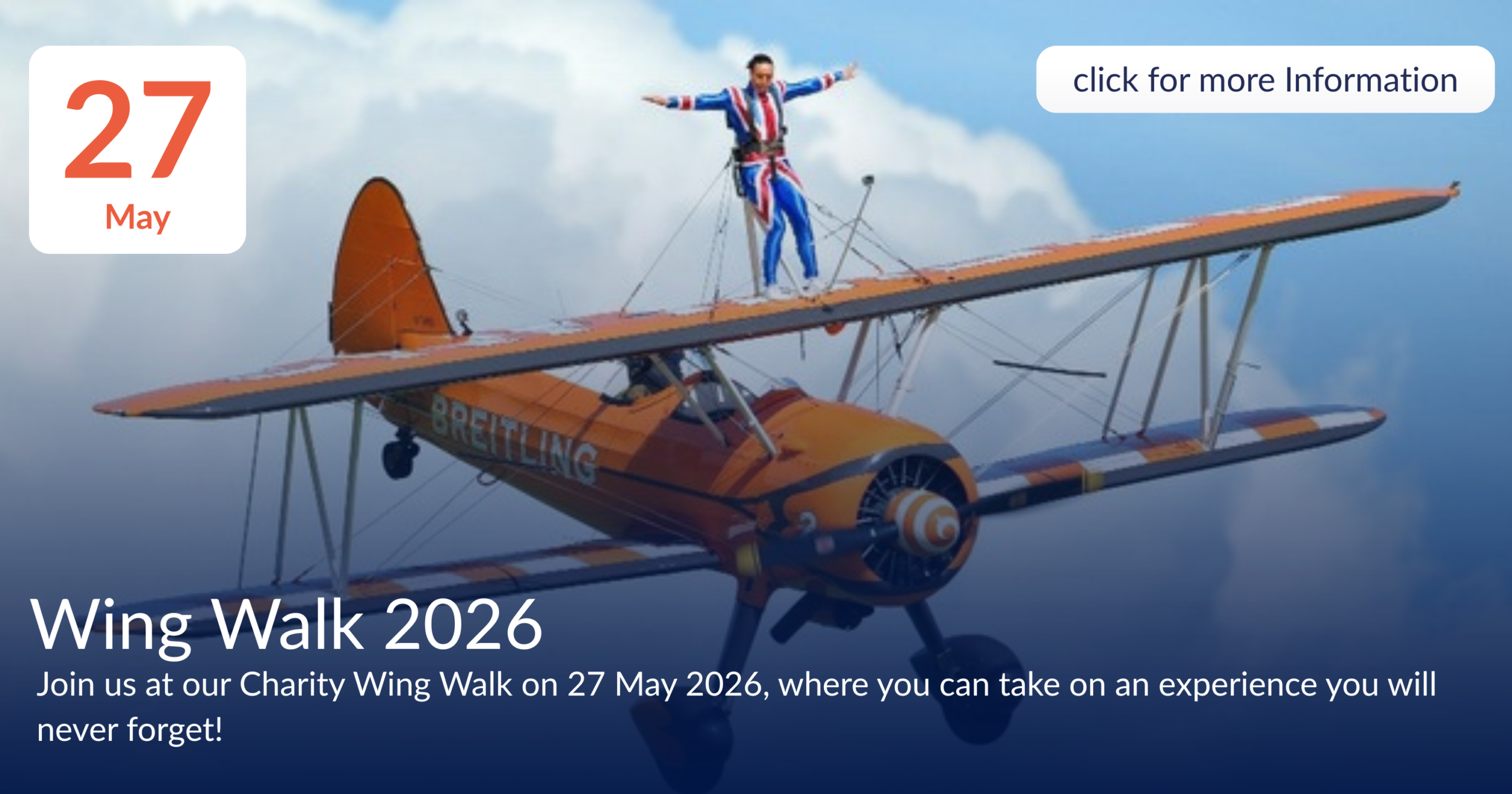 John, a man in his early 40s, jumping from a plane attached to an instructor, wearing his Hope for Tomorrow branded t-shirt